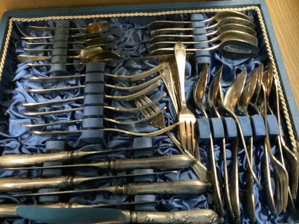 A quantity of Chinese enamelled ornaments, a Satsuma vase, a pair of slip cast ship plaques, a cased set of plated flatware etc